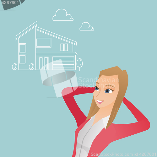 Image of Woman dreaming about buying a new house.