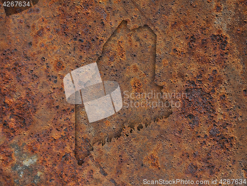 Image of Map of Maine on rusty metal