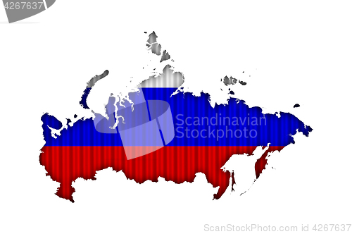 Image of Map and flag of Russia on corrugated iron