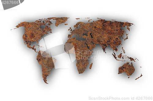 Image of Map of the world on rusty metal