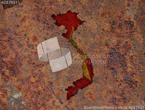 Image of Map and flag of Vietnam on rusty metal