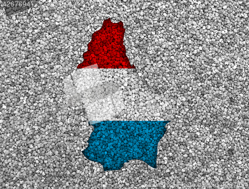 Image of Map and flag of Luxembourg on poppy seeds