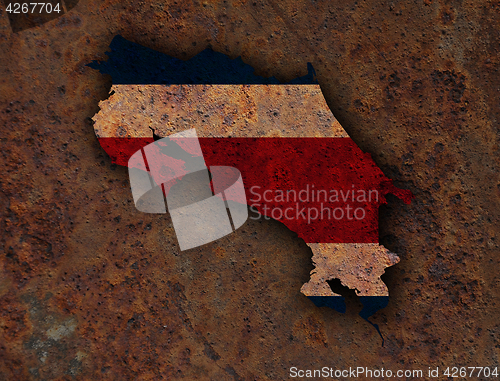 Image of Map and flag of Costa Rica on rusty metal