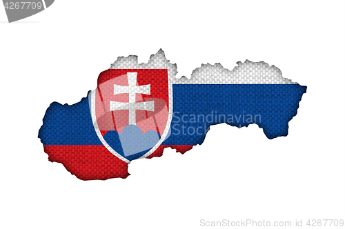 Image of Map and flag of Slovakia on old linen