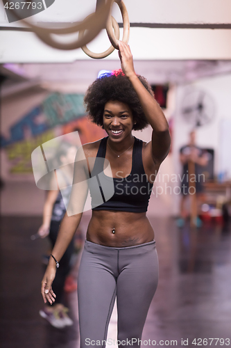 Image of black woman doing dipping exercise