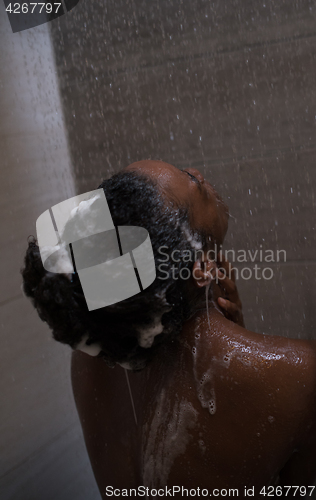 Image of African American woman in the shower