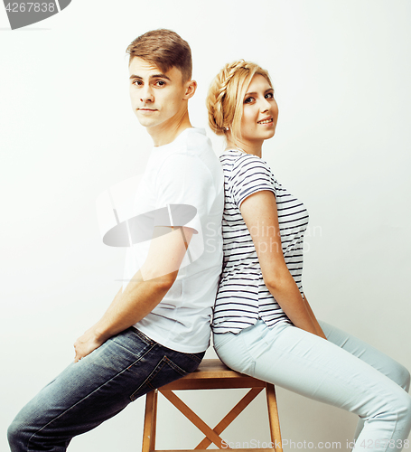 Image of young pretty teenage couple, hipster guy with his girlfriend happy smiling and hugging isolated on white background, lifestyle people concept