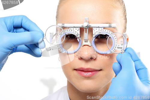 Image of Selection of spectacles, woman ophthalmologist.