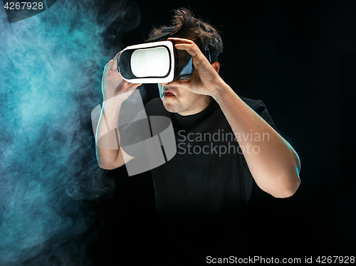 Image of The man with glasses of virtual reality. Future technology concept.