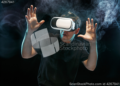 Image of The man with glasses of virtual reality. Future technology concept.