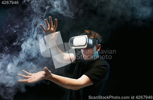 Image of The man with glasses of virtual reality. Future technology concept.