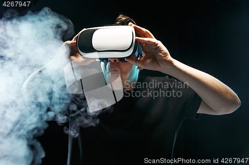 Image of The man with glasses of virtual reality. Future technology concept.