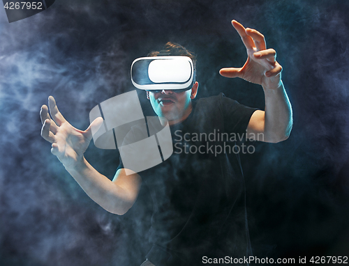 Image of The man with glasses of virtual reality. Future technology concept.