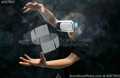 Image of The man with glasses of virtual reality. Future technology concept.