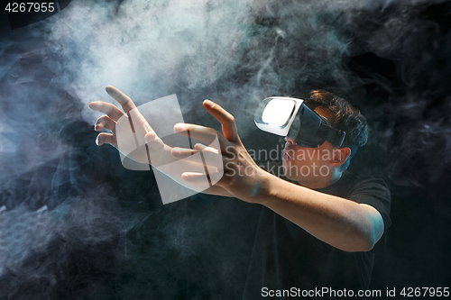 Image of The man with glasses of virtual reality. Future technology concept.
