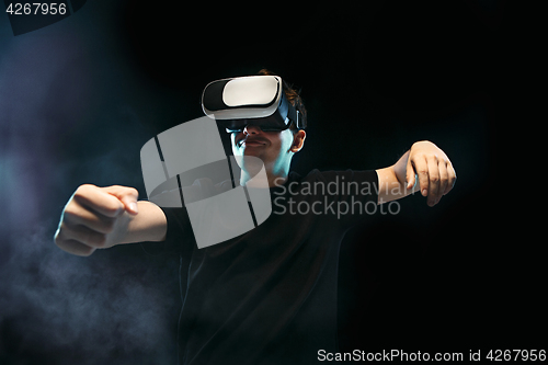 Image of The man with glasses of virtual reality. Future technology concept.