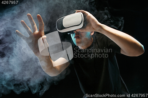 Image of The man with glasses of virtual reality. Future technology concept.