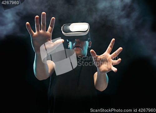Image of The man with glasses of virtual reality. Future technology concept.
