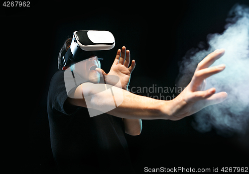Image of The man with glasses of virtual reality. Future technology concept.