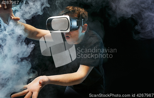 Image of The man with glasses of virtual reality. Future technology concept.