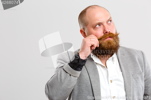 Image of Man beard looking into side