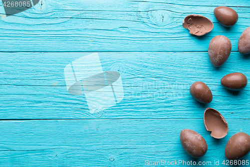 Image of Chocolate eggs on blue background