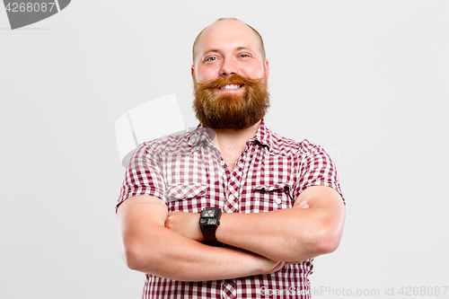 Image of Contented man with beard , mustache