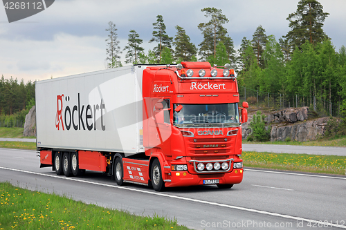 Image of Red Super Scania Semi Trailer on Summer Freeway