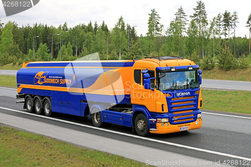 Image of Blue and Yellow Scania Semi Tank Truck Transport