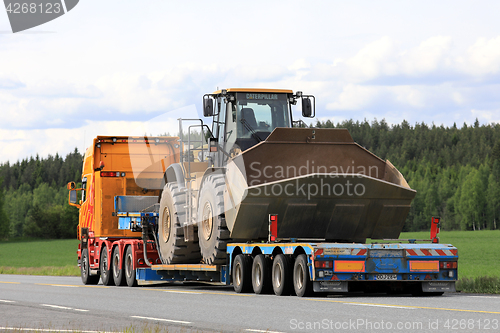 Image of Semi Trailer Hauls Large Cat Wheel Loader