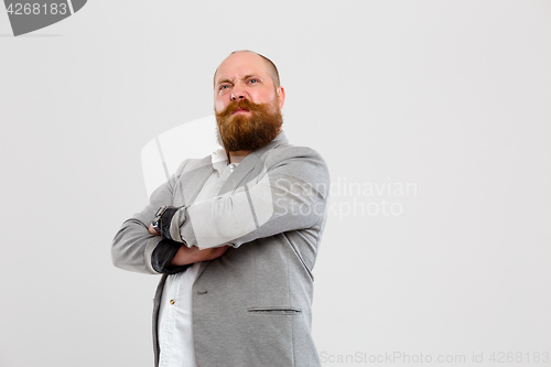 Image of Disgruntled man in gray jacket