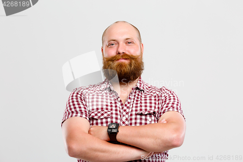 Image of Smiling man with beard ,mustache