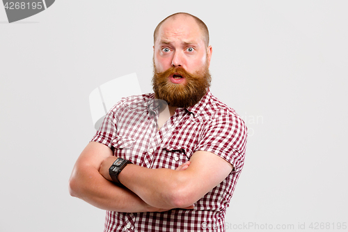 Image of Surprised man with beard , mustache