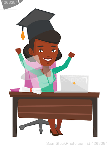 Image of Graduate using laptop for education.