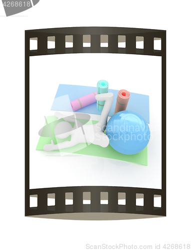 Image of 3d man on a karemat with fitness ball. 3D illustration. The film