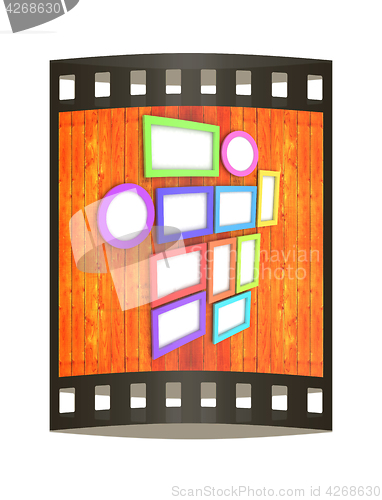 Image of Mock up picture frames on wood wall. 3d illustration. The film s