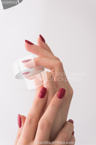 Image of closeup of hands of a young woman