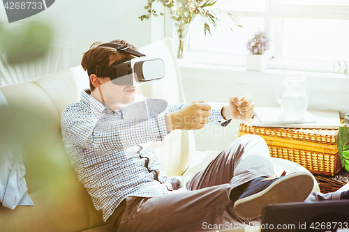 Image of The man with glasses of virtual reality. Future technology concept.