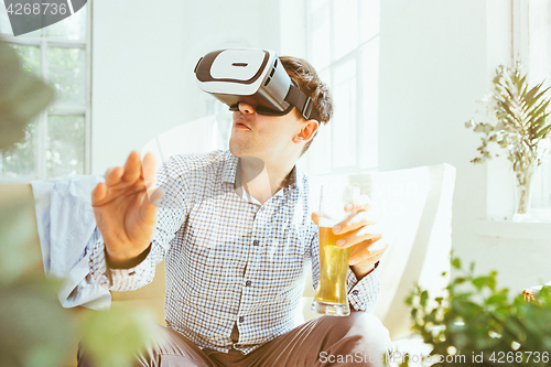 Image of The man with glasses of virtual reality. Future technology concept.