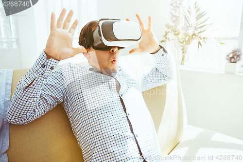 Image of The man with glasses of virtual reality. Future technology concept.