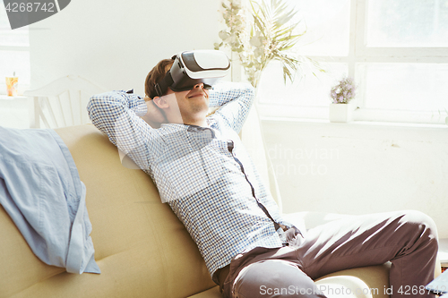 Image of The man with glasses of virtual reality. Future technology concept.