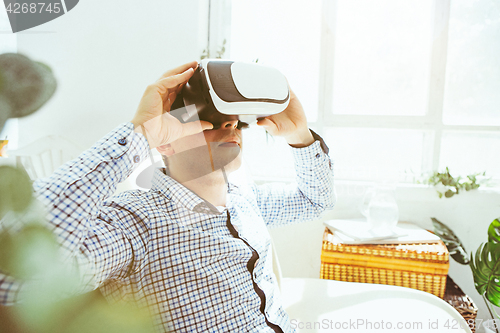 Image of The man with glasses of virtual reality. Future technology concept.