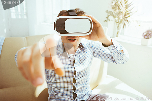 Image of The man with glasses of virtual reality. Future technology concept.