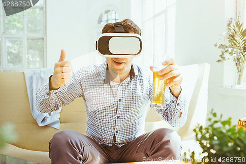 Image of The man with glasses of virtual reality. Future technology concept.