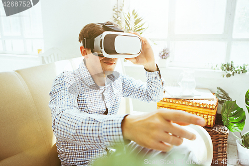 Image of The man with glasses of virtual reality. Future technology concept.