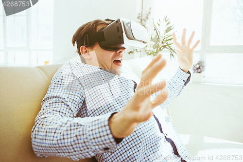 Image of The man with glasses of virtual reality. Future technology concept.