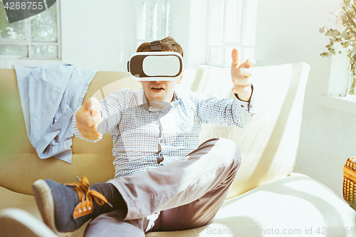 Image of The man with glasses of virtual reality. Future technology concept.