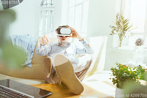 Image of The man with glasses of virtual reality. Future technology concept.