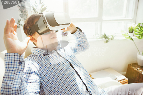 Image of The man with glasses of virtual reality. Future technology concept.