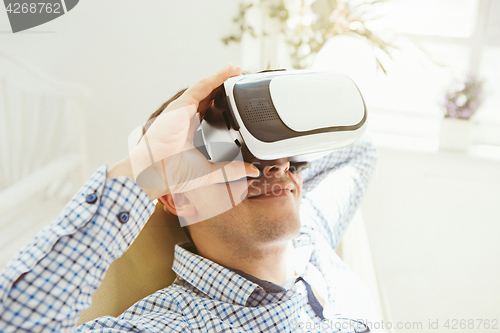 Image of The man with glasses of virtual reality. Future technology concept.